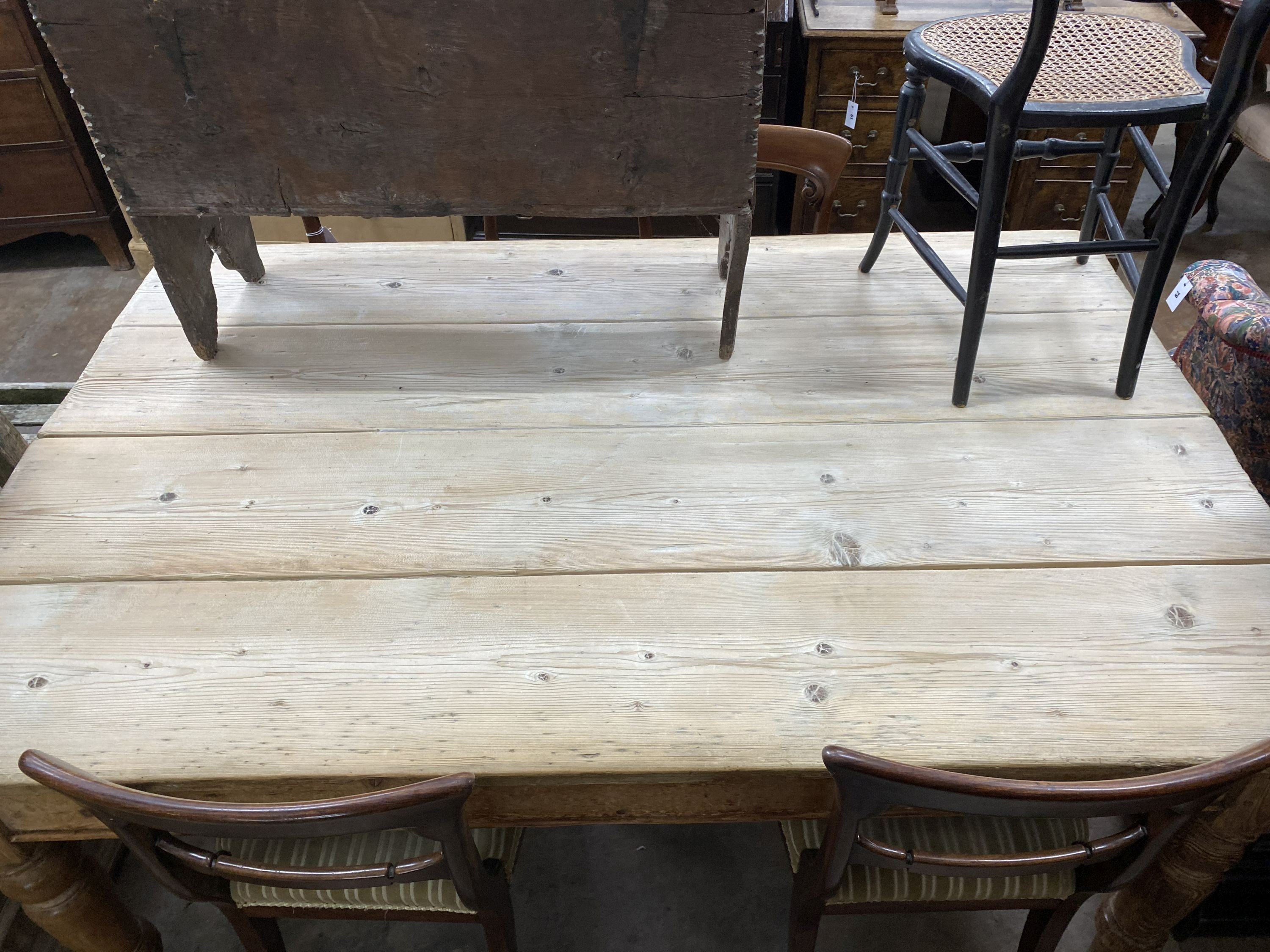 A Victorian retangular pine kitchen dining table, fitted with a later drawer, width 168cm, depth 108cm, height 74cm